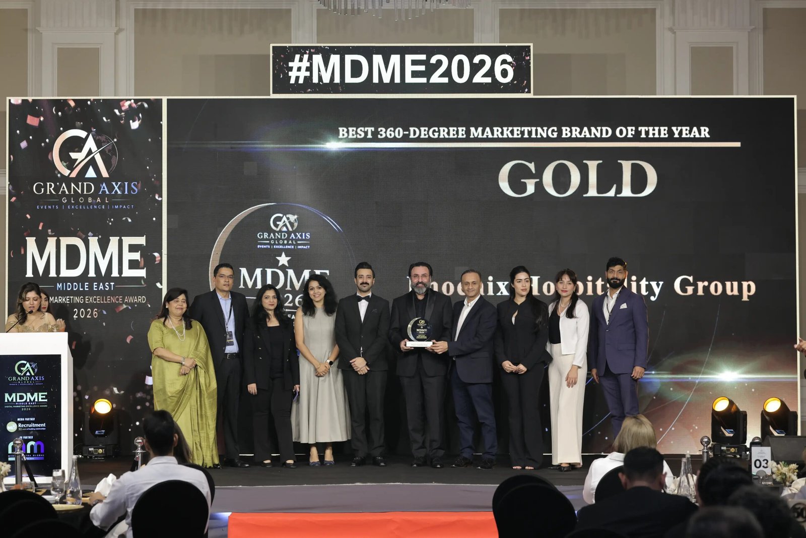 Phoenix-Hospitality-Group-Axis-International-gold